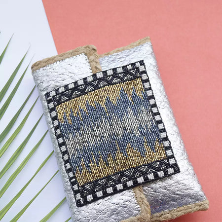 Silver foil printed braided jute handcrafted flapover clutch