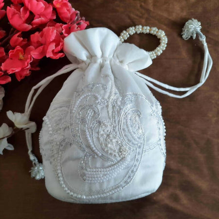 PEARL EMBELLISHED WHITE ROUND POTLI BAG WITH PEARL HANDLE