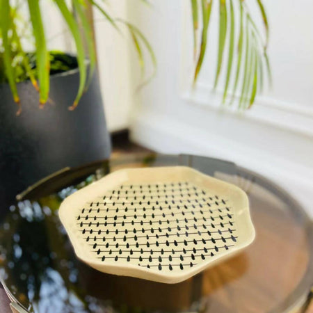 Ivory with black lines plate